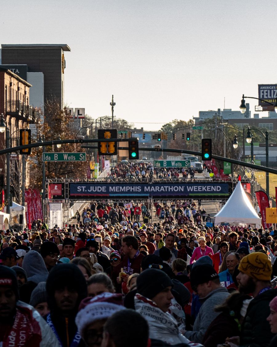 Runners crowd the finish area at St. Jude Memphis Marathon Weekend
